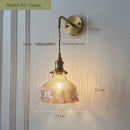 Vintage glass wall light with brass socket