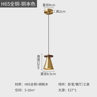 Elegant walnut wood and copper pendant light for sophisticated interiors