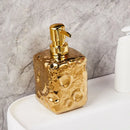 golden ceramic bottle with moon decor for lotion