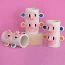 abstract ceramic vase with human face floral decoration