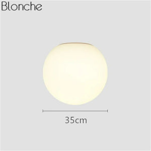 Modern glass wall light for decorative indoor lighting