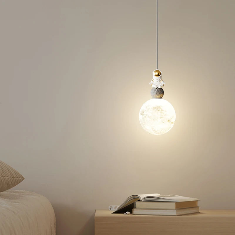 Resin astronaut pendant light