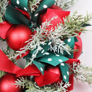 Festive Christmas wreath with ribbons and decorative baubles