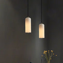 Naturan marble chandelier with single copper bulb lighting