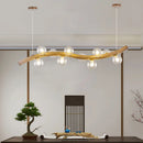 Solid wood and glass pendant light