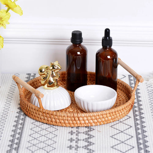 round woven rattan basket with handle for storage and display - vue 4 sur 7