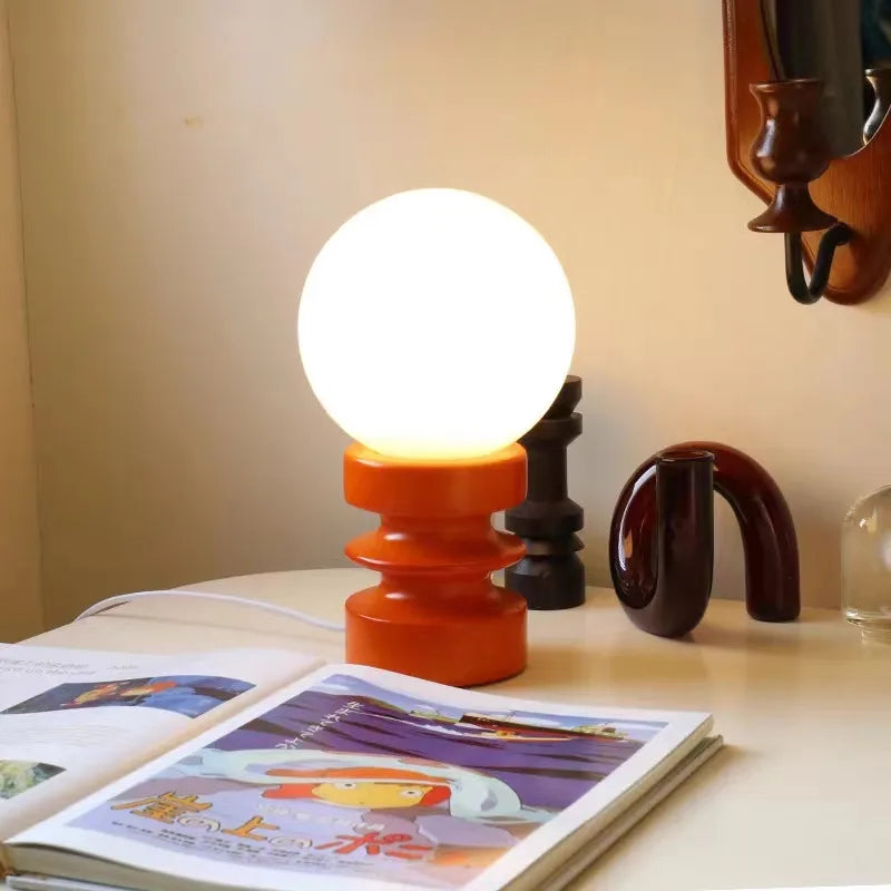 Designer glass table lamp for a warm atmosphere