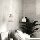 Modern pendant light in natural marble and copper with elegant design