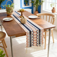 Bohemian table runner with Aztec patterns and beige tassels