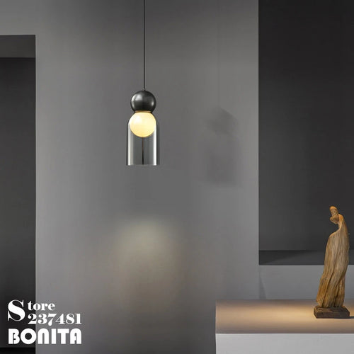 Transparent glass pendant light with decorative copper head - vue 6 sur 10
