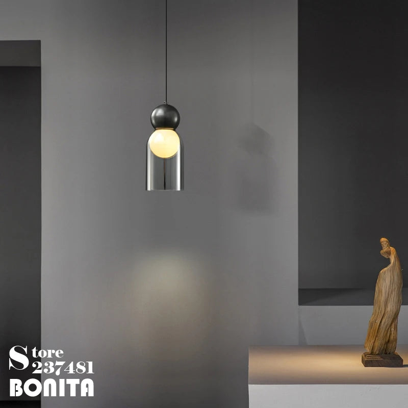 Transparent glass pendant light with decorative copper head - vue 5 sur 10