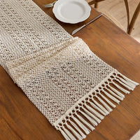 Beige boho woven table runner with geometric tassels