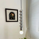 Minimalist industrial bedside lamp with elegant wave design