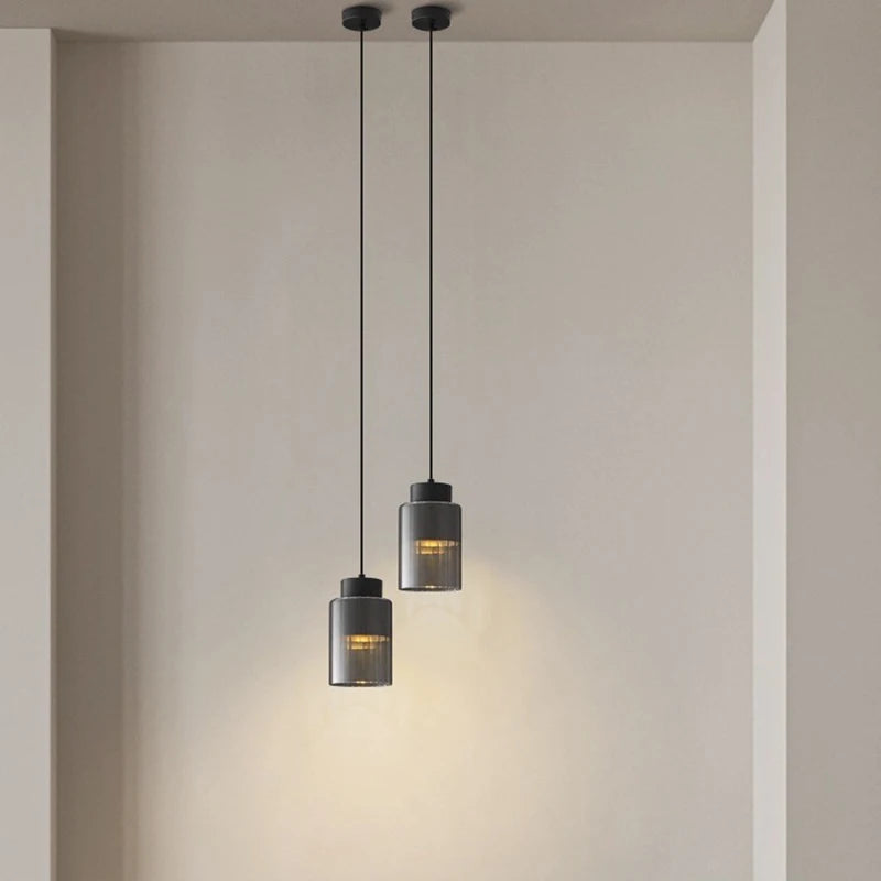 Modern glass and brass chandelier with adjustable wire