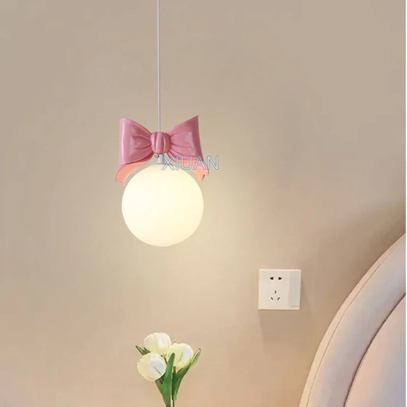 Bedside pendant light for small room with bow