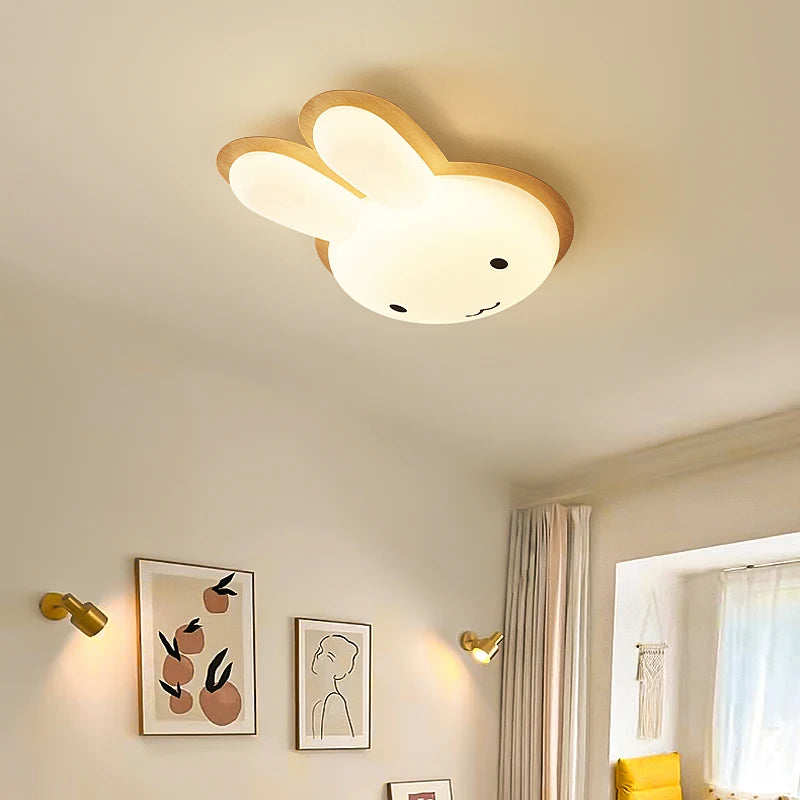 Modern children's chandelier with wooden rabbit design
