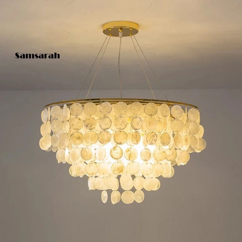 Gold metal pendant light for an elegant interior