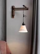 Elegant and functional extendable copper wall light