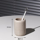 modern bathroom accessory set made of sand and gravel