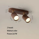 Surface mounted LED spotlight with replaceable bulb and adjustable heads
