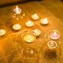 Round glass candle holder for festive and event decorations