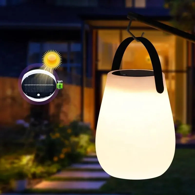 Rechargeable cordless solar lantern with silicone handle