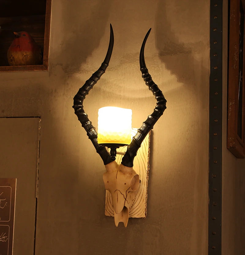 Sheep horn wall light for industrial decor