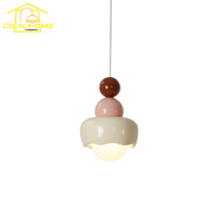 Modern designer pendant light in resin and glass for children's interiors