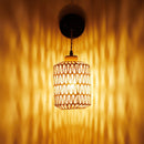 Rattan wall light for rustic interior decor
