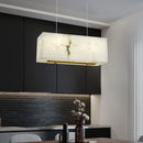 Minimalist marble and copper chandelier for modern spaces
