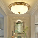 Vintage copper ceiling light with round glass shade