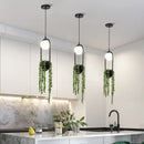 Retro iron pendant light with decorative plant and LED lighting