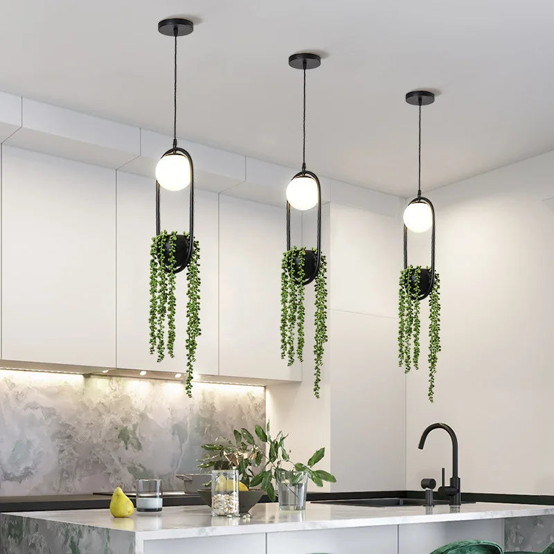 Retro iron pendant light with decorative plant and LED lighting