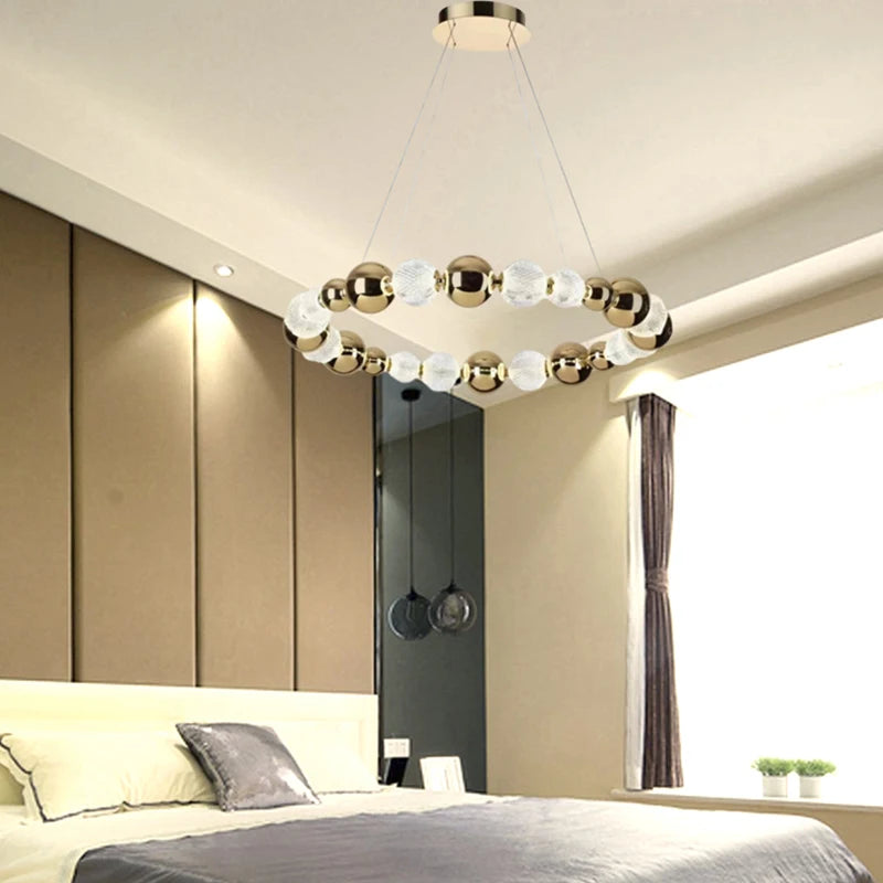 LED chandelier with acrylic ball, gold ring and adjustable wires