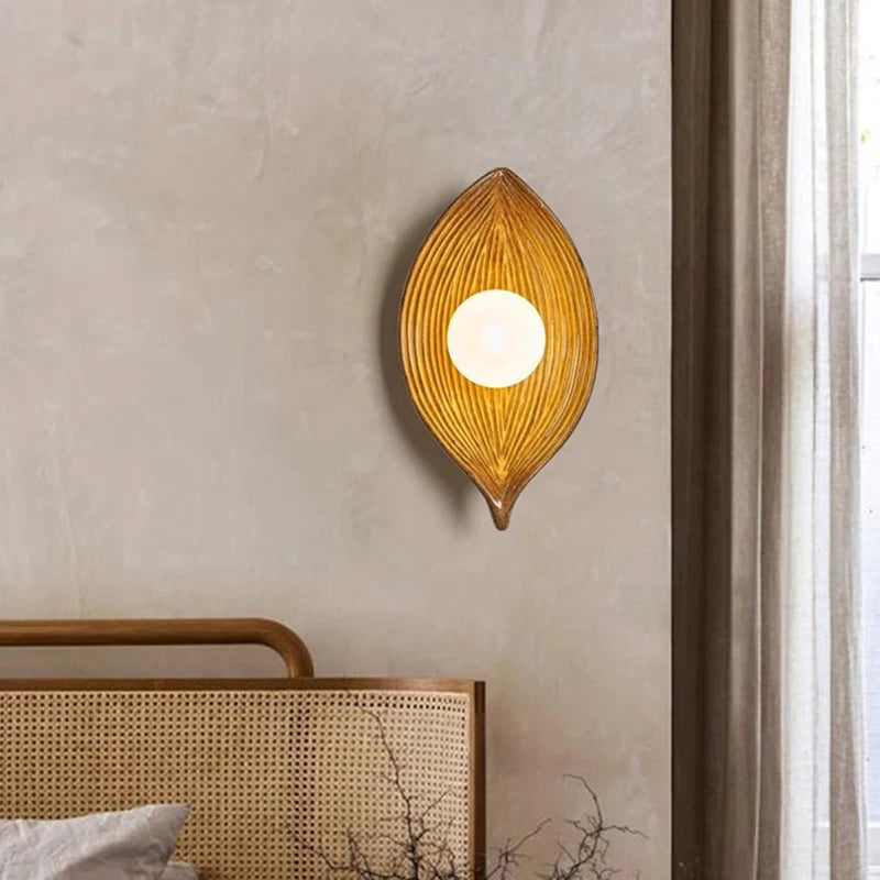 Artistic resin and glass leaf-shaped wall light for hallway lighting