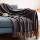 Nordic knitted throw with pompoms scandinavian style