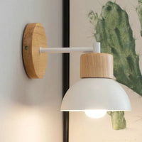 Modern bird-shaped wooden and iron wall light