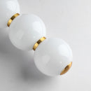 Designer LED pendant light with glossy gold glass ball