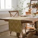 Beige and black geometric table runner with tassels