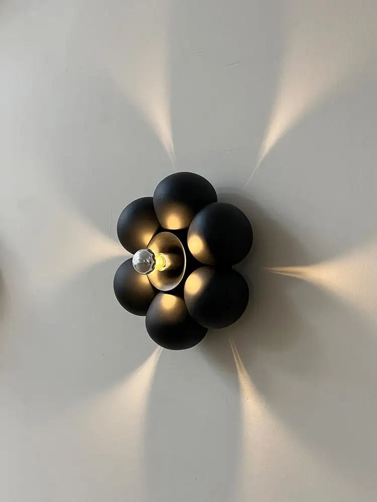 Minimalist flower shaped wall light for a soft atmosphere