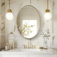 Brushed gold mirror with decorative metal frame