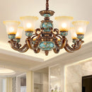 Vintage European glass and resin chandelier with sculpted flowers