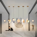 Modern glass LED pendant light with adjustable cable for indoor decor