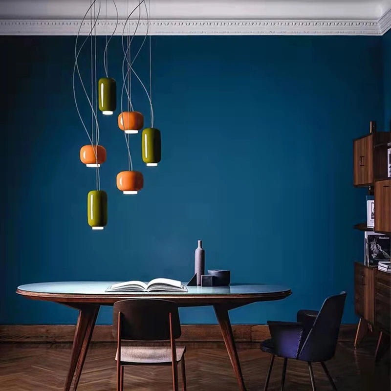 Modern glass pendant light with adjustable cord for various spaces