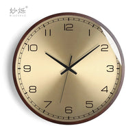 modern design wall clock in golden wood silent and creative