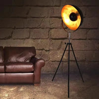 Adjustable industrial floor lamp with flexible tripod for modern interiors
