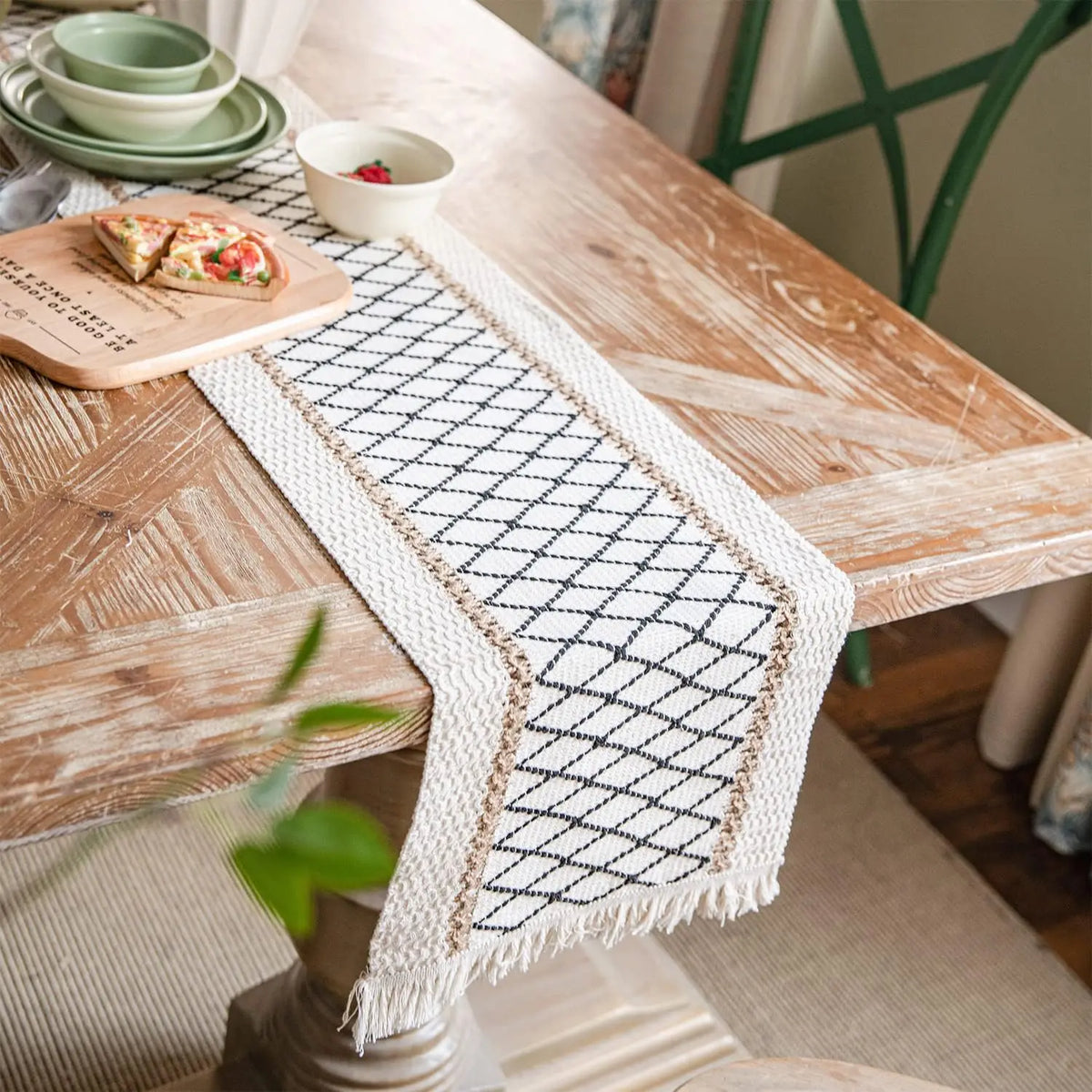 Bohemian cotton table runner with geometric pattern and beige tassels