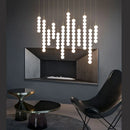 Art deco style glass pendant light in gold and chrome