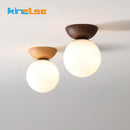 Nordic walnut wood grain LED ceiling light with round glass shade