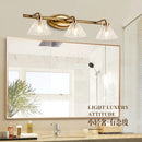 Vintage LED wall light with 2 or 4 heads and clear bronze shade